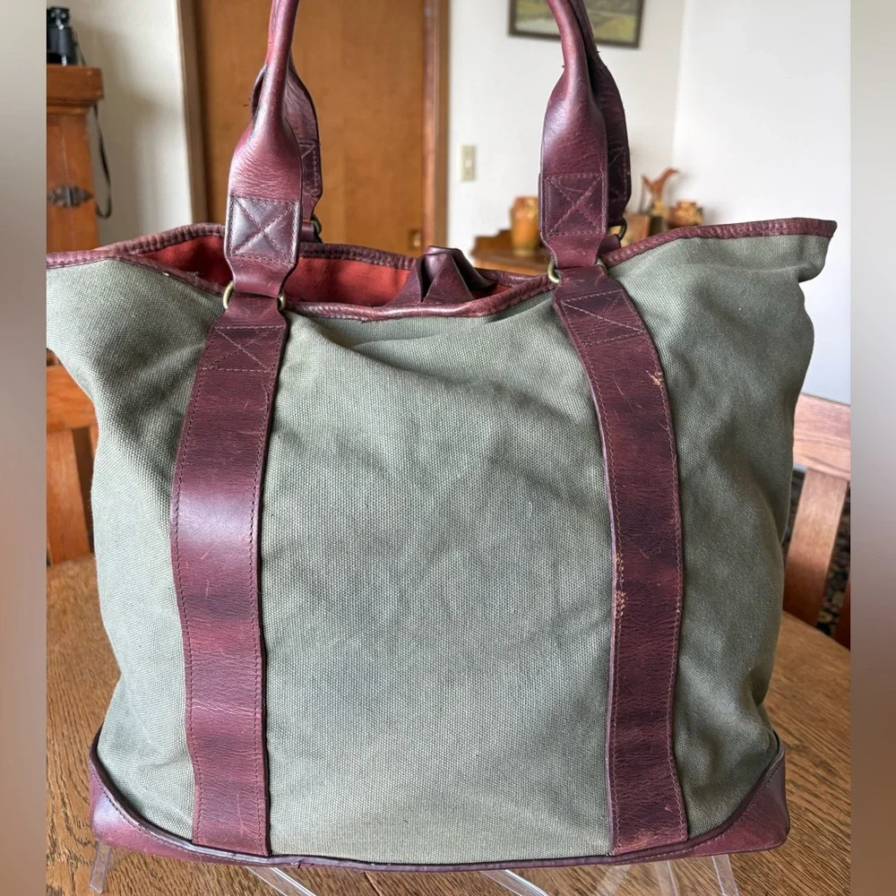 Vintage Eddie Bauer, green canvas w/leather trim handles/bottom top snap closure